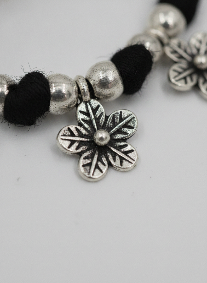 Silver Oxidized Black Thread Floral Charm Bracelet for Women and Girls - MVJPBRSR201