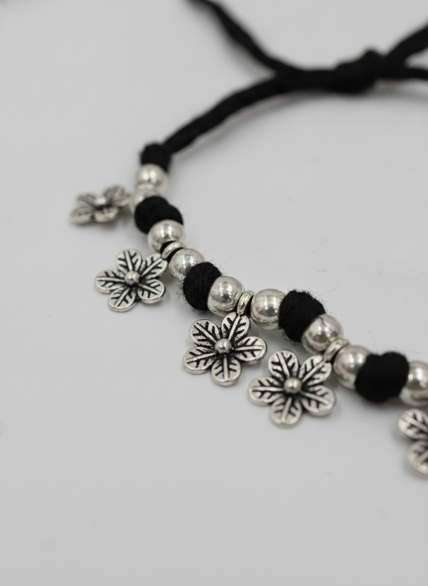 Silver Oxidized Black Thread Floral Charm Bracelet for Women and Girls - MVJPBRSR201