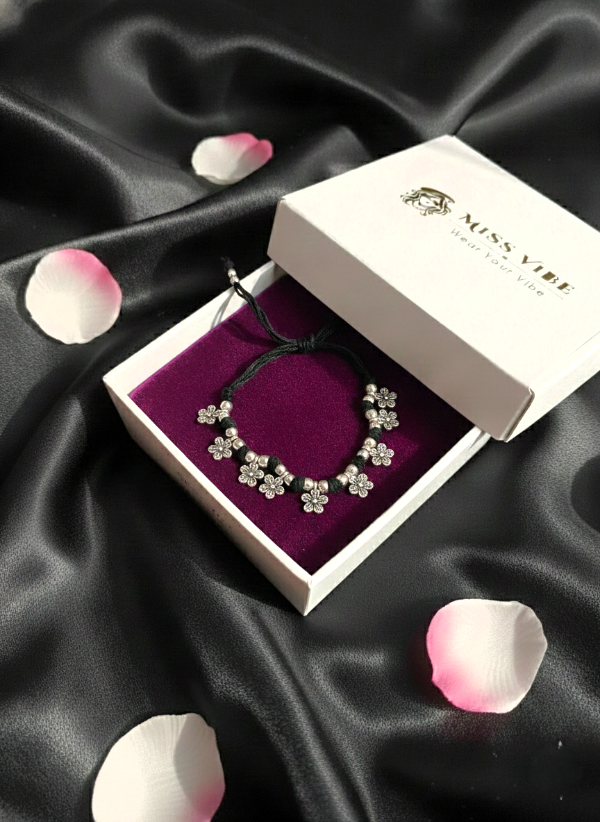 Silver Oxidized Black Thread Floral Charm Bracelet for Women and Girls - MVJPBRSR201