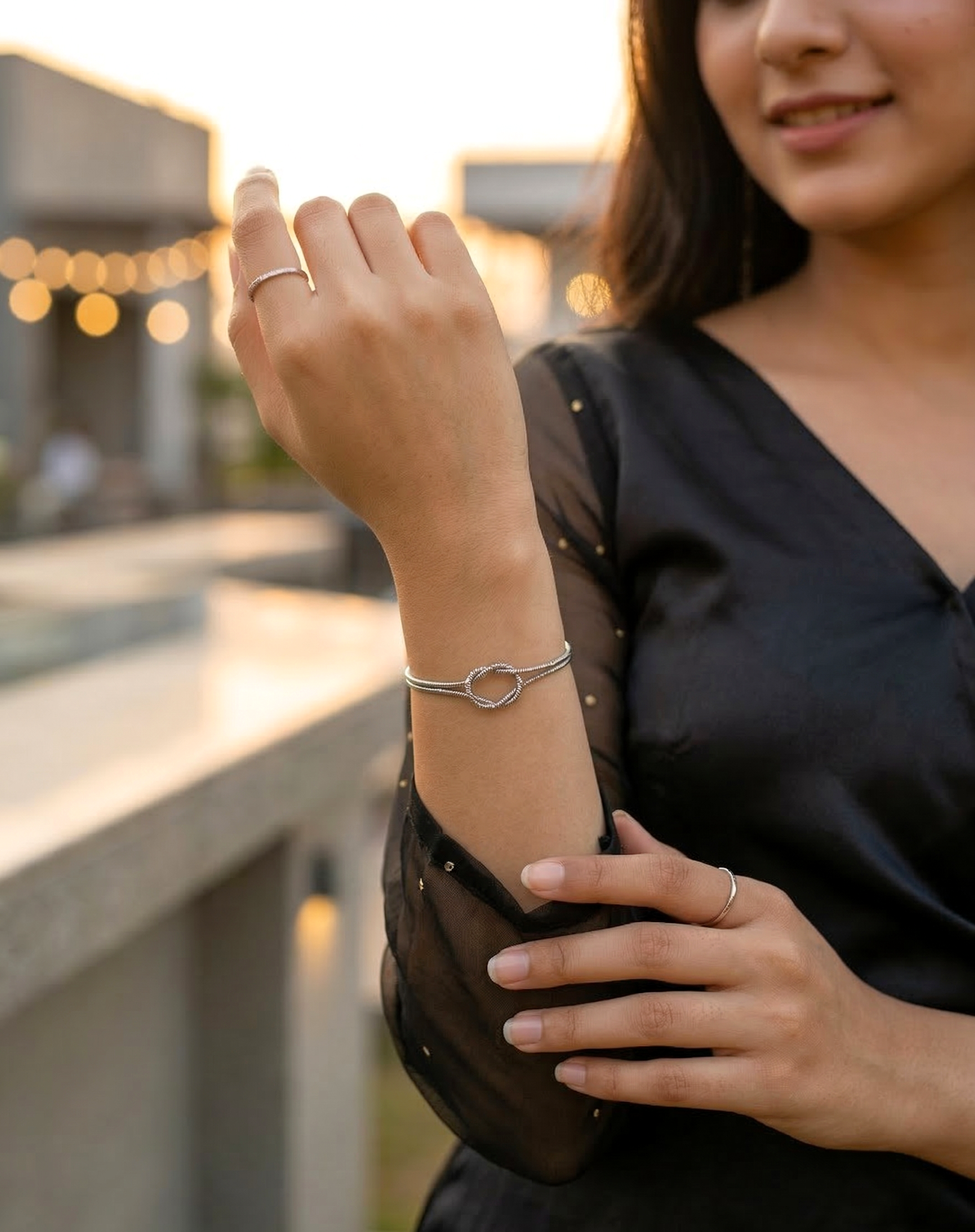 Elegant Silver Toned Minimalist Interlocking Knot Snake Chain Bracelet for Women - MVKMBRSR169
