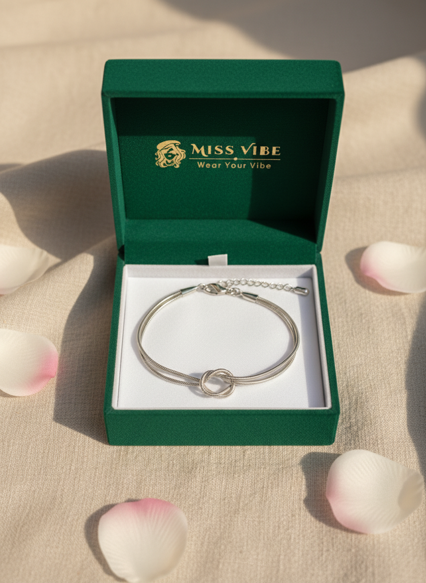 Elegant Silver Toned Minimalist Interlocking Knot Snake Chain Bracelet for Women - MVKMBRSR169