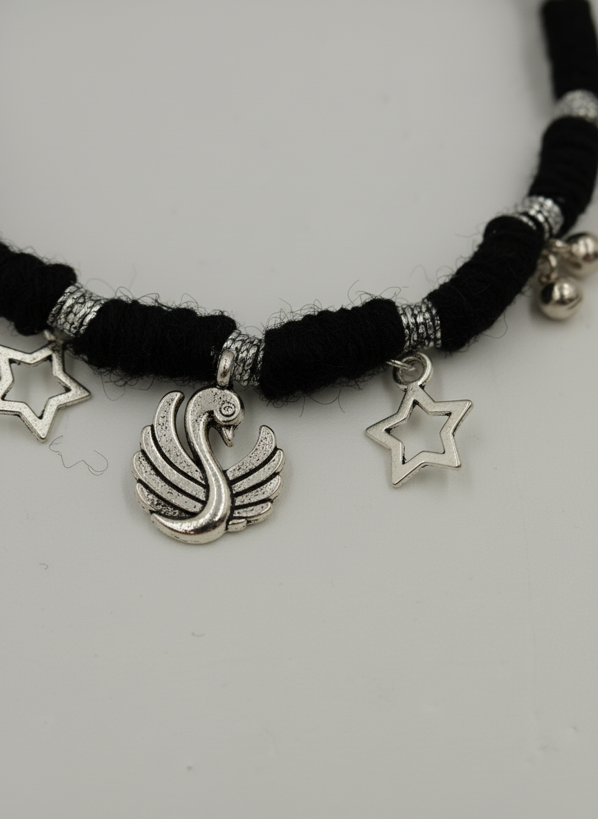 Women Black Thread Charm Bracelet with Oxidized Silver Swan and Star Charms - MVDRBRGD173