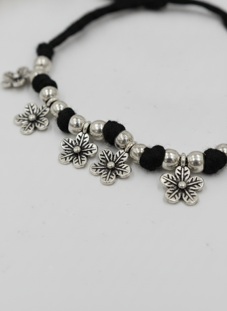 Silver Oxidized Black Thread Floral Charm Bracelet for Women and Girls - MVJPBRSR201