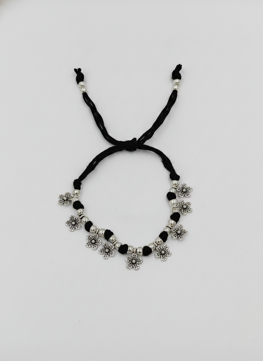 Silver Oxidized Black Thread Floral Charm Bracelet for Women and Girls - MVJPBRSR201