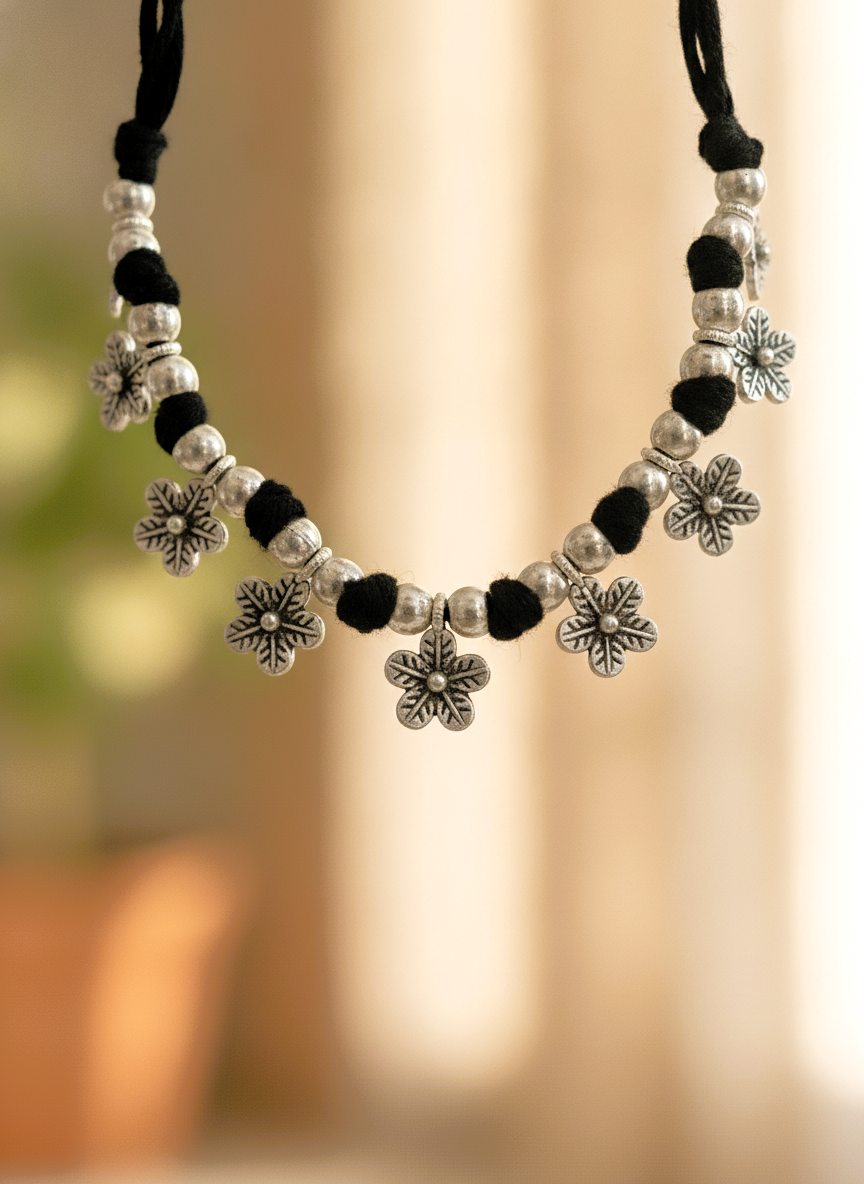 Silver Oxidized Black Thread Floral Charm Bracelet for Women and Girls - MVJPBRSR201